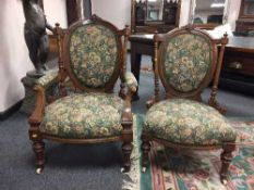 A matched pair of late Victorian walnut salon chairs