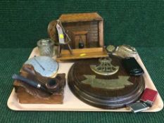 A tray of wooden pipe rack modelled as a fire place, table lighters,