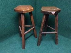 A pair of pine bar stools