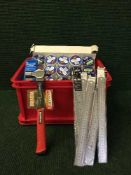 A box of hand tools, metal rules,