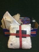 A box of linen, sewing accessories,