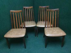 Four mid 20th century teak G Plan chairs