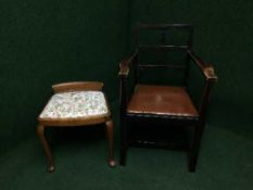 An oak armchair and a dressing table stool