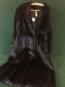 A lady's full length Coney fur coat