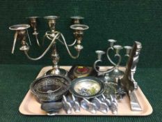 A tray of Viners five way plated candelabra, wine coasters, cast iron door stop,