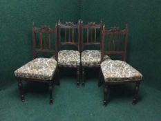 A set of four Edwardian dining chairs