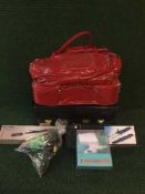 Two boxes of hair dryers, ceramic tong and hair brushes, two leather briefcases, light boards,