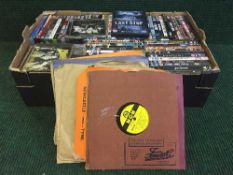 A box of DVDs and CDs and a large quantity of 78's