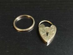 A 9ct gold ring and a 9ct gold padlock, 4.