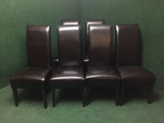 Six leather high backed dining chairs