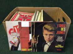 Two boxes of paper back books - Westerns and a box of records - Bing Crosby etc