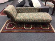A fringed Persian rug on red ground,