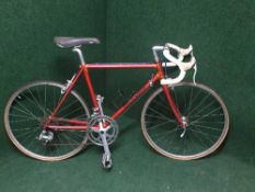 A boy's Colnago racing bike