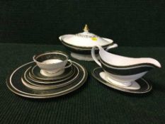 Approximately sixty-one pieces of Royal Doulton Vanborough bone china dinner ware