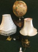 An inlaid musical table containing sewing items,