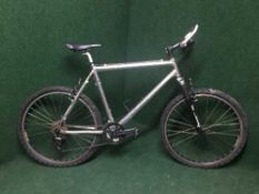 A chrome front suspension mountain bike