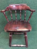 A captain's style armchair