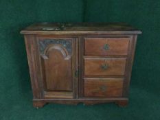 A Victorian mahogany cabinet fitted three drawers