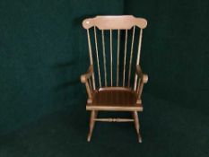A pine rocking chair