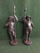 A pair of cast metal cavalier figures