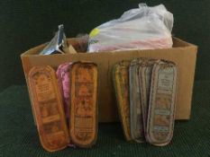 A box containing a large quantity of incense sticks