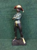 A cast metal figure - Masquerade