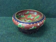 A Japanese cloisonne enamel bowl on hardwood stand