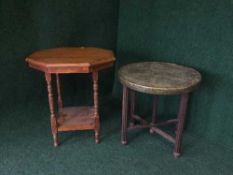 A folding oak brass topped table and an occasional table