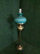 A Victorian brass oil lamp