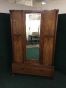 A Victorian inlaid walnut mirror door wardrobe,