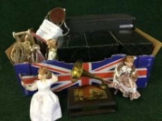 A box of boxed Harley Davidson die cast vehicle, three brass Phonograph music boxes, dolls,