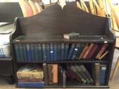 A set of mahogany open shelves with a quantity of books - school boy adventures,