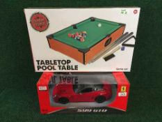 A Rastar radio-controlled toy : Ferrari 599 GTO, 1/14 scale, brand new and boxed,