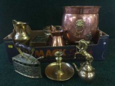 A box containing a quantity of antique brass and copper ware including copper lion mask planter,