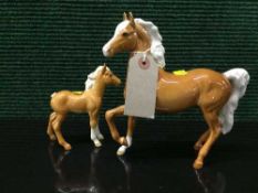 A brown gloss Beswick horse and foal (2)