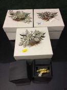 Three boxed Halo & Company hair slides,