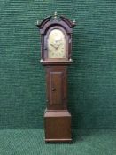 An early 20th century oak miniature longcase clock