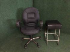 A contemporary swivel office armchair and breakfast bar stool