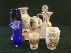 A tray of lustre vases, calendar plates, ships decanter, commemorative mugs,