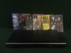 Four boxes containing a large quantity of DVD's together with a Toshiba DVD player