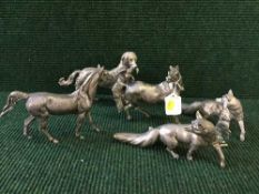 A tray of six metal figures - horses,