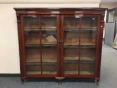 A Victorian mahogany glazed two door bookcase,
