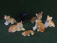 A tray of seven china Russian figures - tiger and cubs