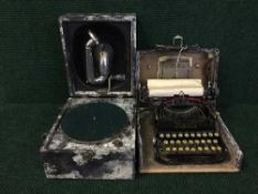 A cased Corona typewriter,