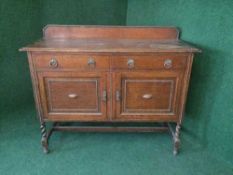 An oak barley twist sideboard