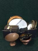 A box of brass porthole mirrors, metal framed mirror, horse brasses,