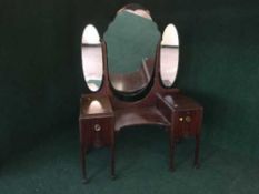 An Edwardian dressing table with triple mirror