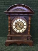 A Victorian oak cased bracket clock