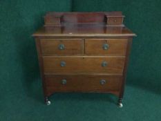 A Victorian mahogany four drawer chest