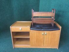 A late 20th century teak telephone seat and a mag rack